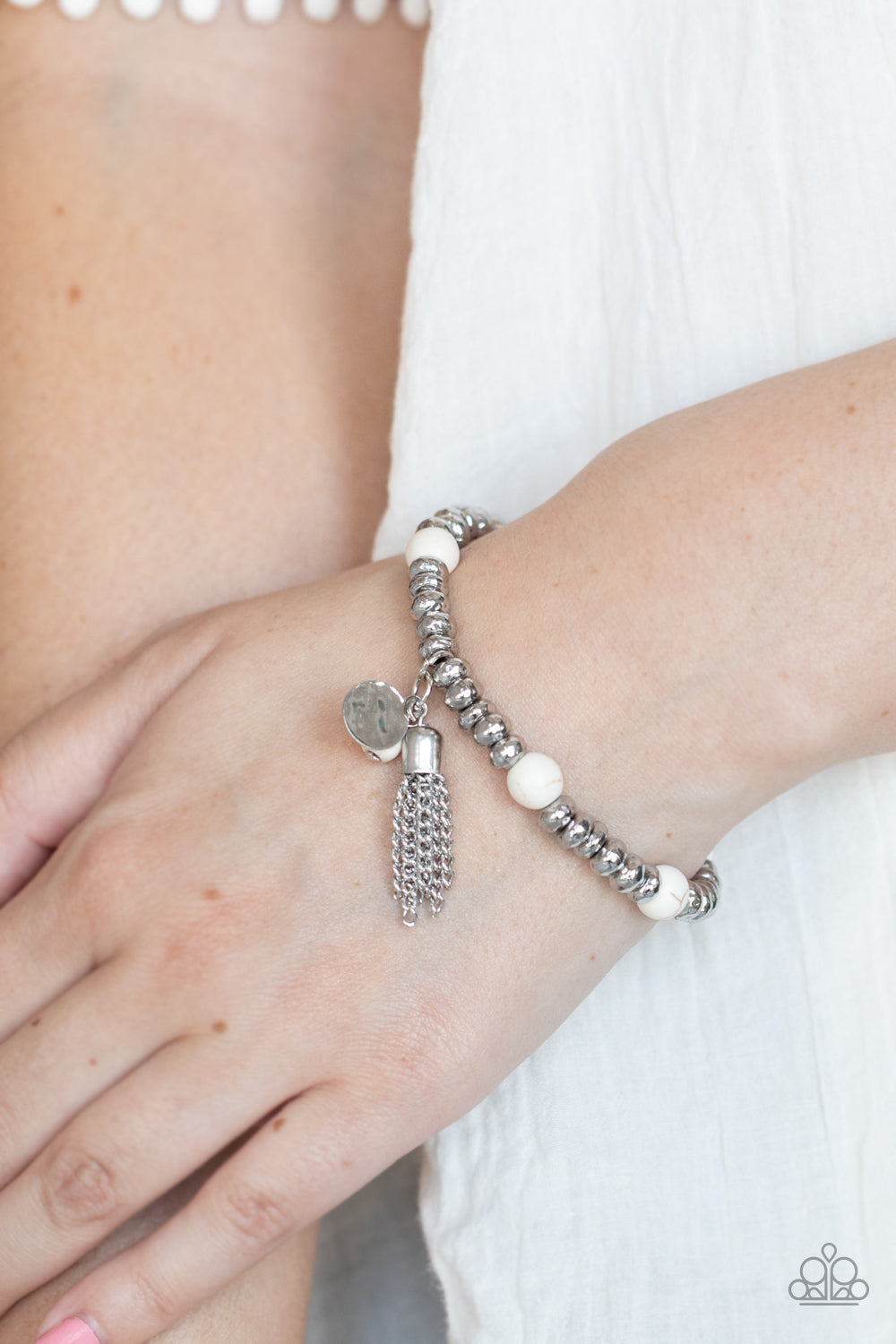WHIMSICALLY WANDERLUST - WHITE CRACKLE STAND STONE SILVER TASSEL STRETCH BRACELET
