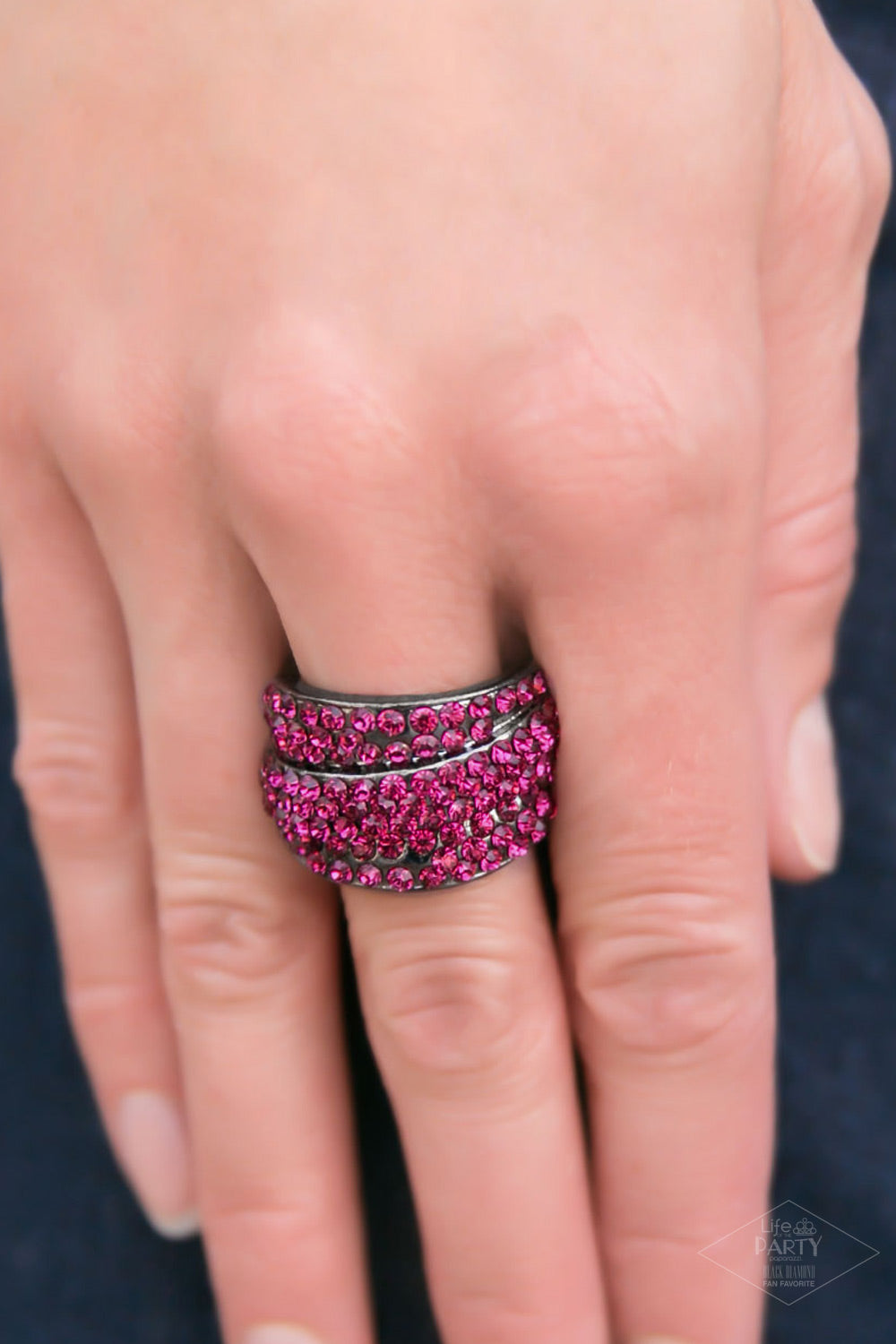 THE MILLIONAIRES CLUB - PINK RHINESTONES ON BLACK RING