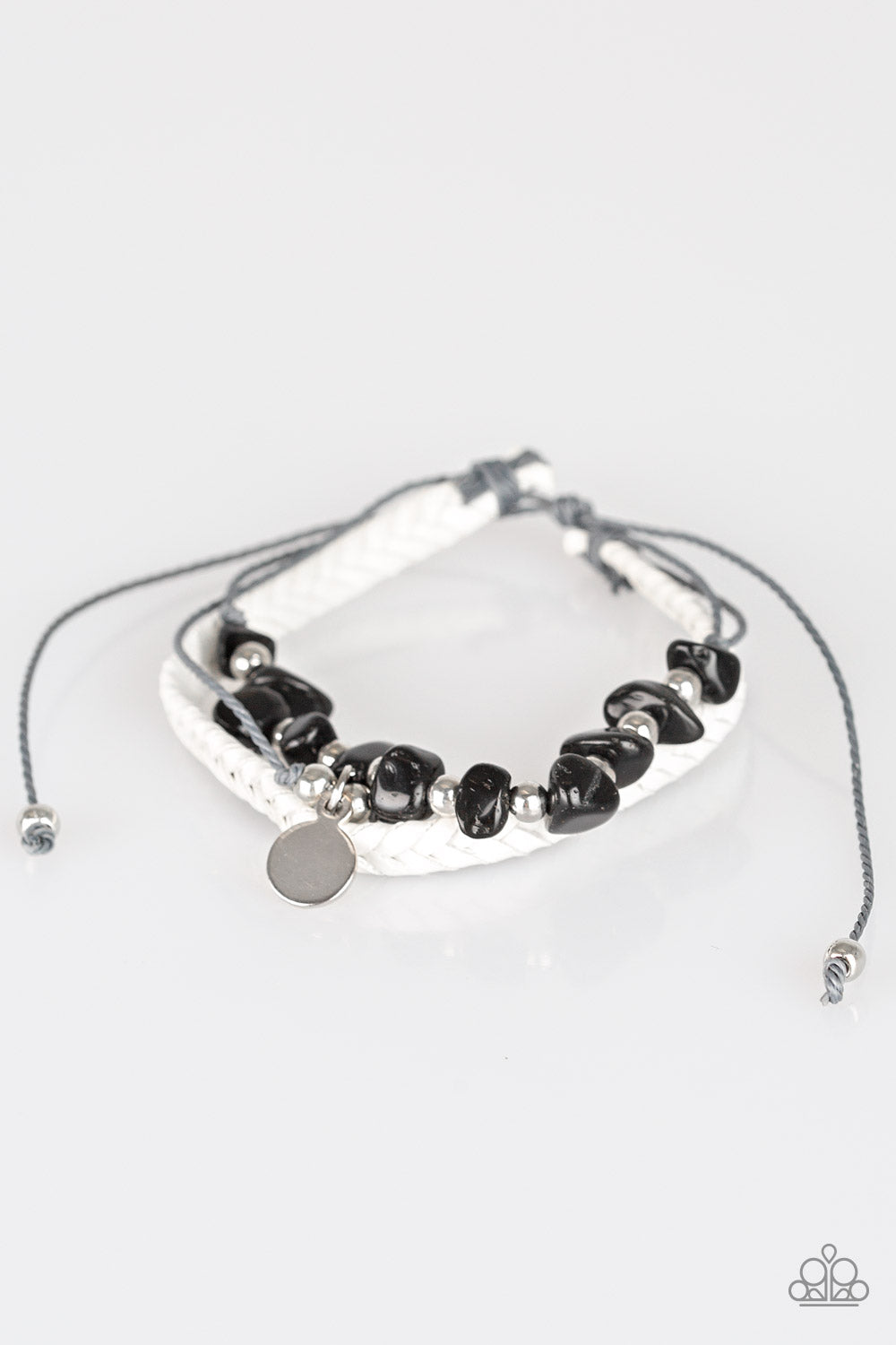A PEACE OF WORK - BLACK POLISHED STONE SILVER CHARM WHITE BRAIDED DRAW STRING BRACELET