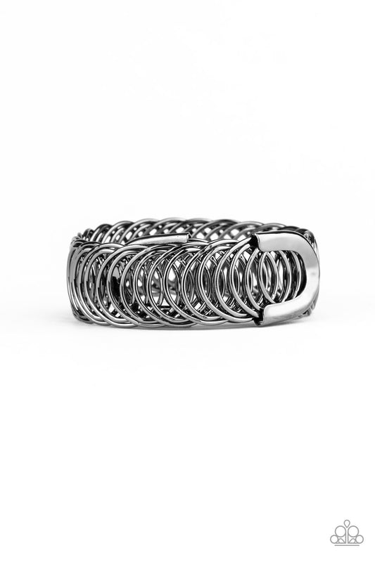 DIZZYINGLY DEMURE - BLACK COIL BRACELET
