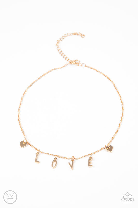 LOVE CONQUERS ALL - GOLD LETTERS NECKLACE